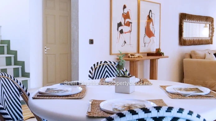 A home with a large garden that breathes elegance.