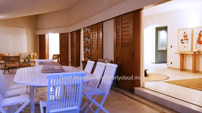 A home with a large garden that breathes elegance.