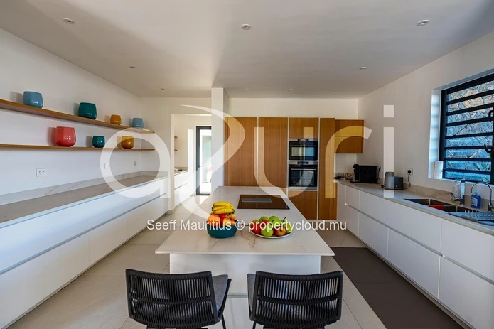 Elegant Villa with Golf Course Views and Ocean Breezes