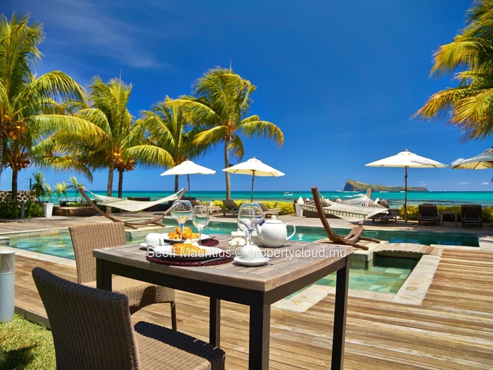 Panoramic Ocean Views from This 4-Bedroom Beachfront Penthouse