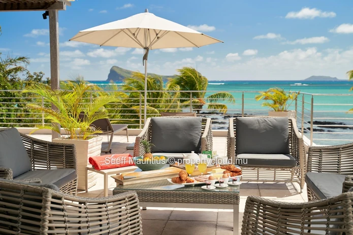 Panoramic Ocean Views from This 4-Bedroom Beachfront Penthouse