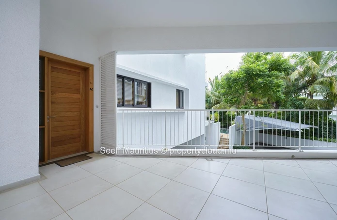 Garden-Level Elegance Steps from the Sea