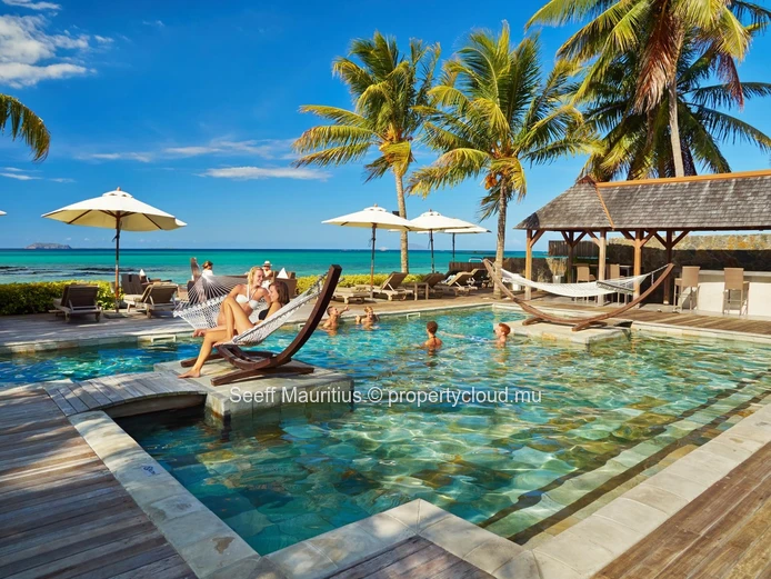 Panoramic Ocean Views from This 4-Bedroom Beachfront Penthouse