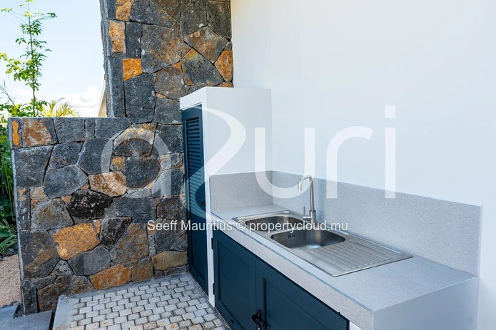 Elegant Villa with Golf Course Views and Ocean Breezes