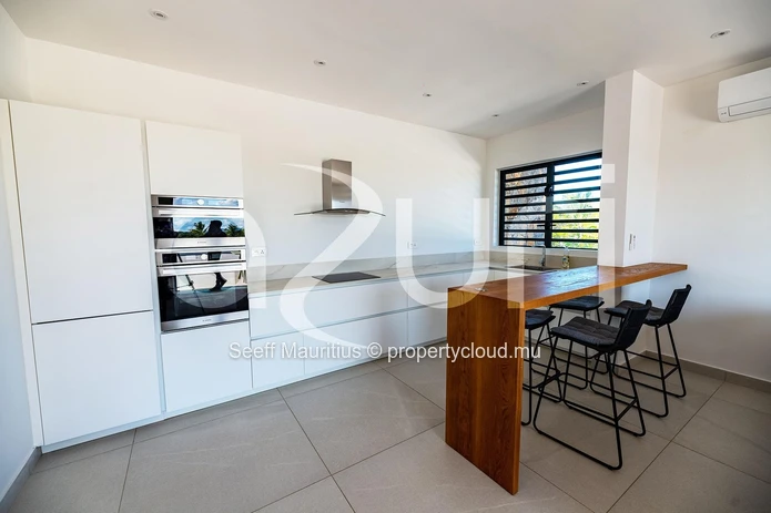 Elegant Villa with Golf Course Views and Ocean Breezes