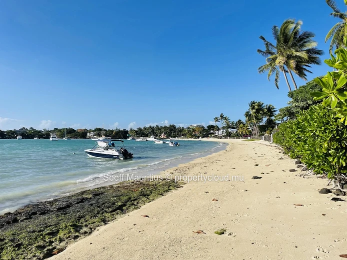 Stunning beachfront apartment nestled right on the edge of the sandy shoreline, providing the perfect coastal escape.