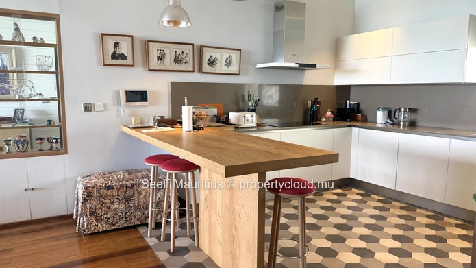 Experience Unrivaled Beachfront Luxury in Roches Noires