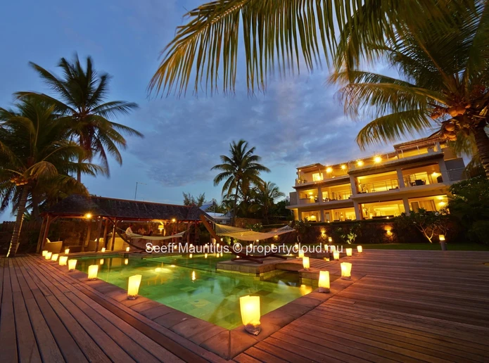 Panoramic Ocean Views from This 4-Bedroom Beachfront Penthouse