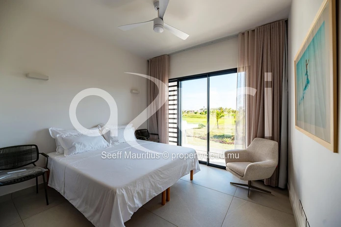Elegant Villa with Golf Course Views and Ocean Breezes