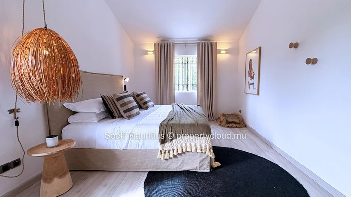 A home with a large garden that breathes elegance.