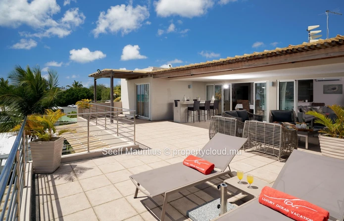 Panoramic Ocean Views from This 4-Bedroom Beachfront Penthouse