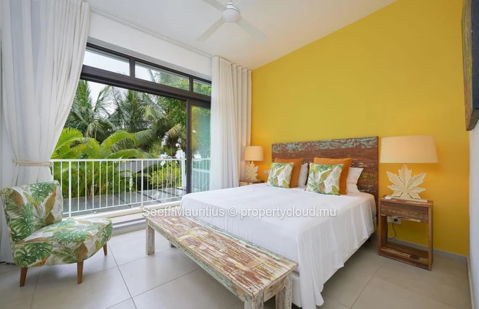 Garden-Level Elegance Steps from the Sea