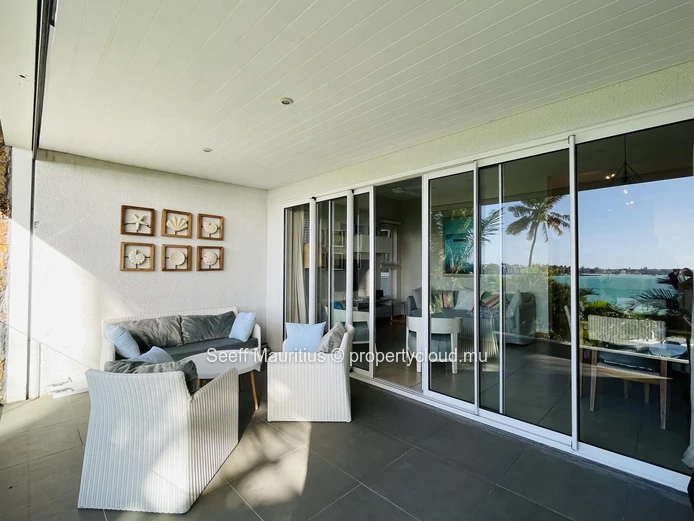 Stunning beachfront apartment nestled right on the edge of the sandy shoreline, providing the perfect coastal escape.