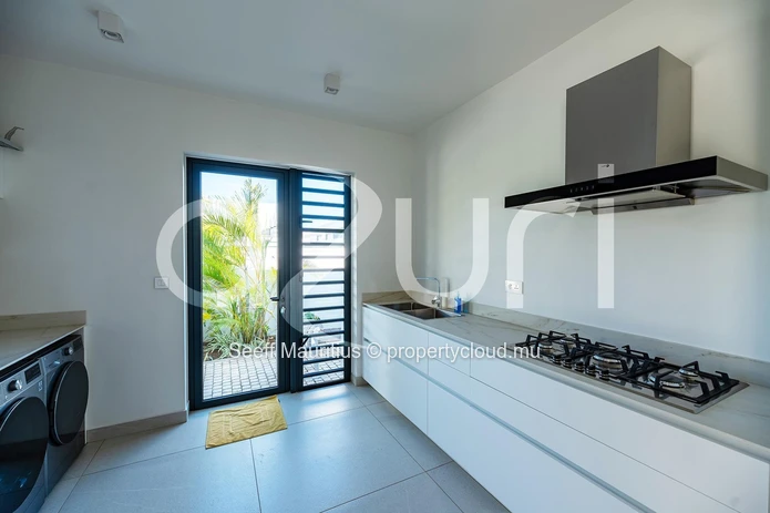 Elegant Villa with Golf Course Views and Ocean Breezes