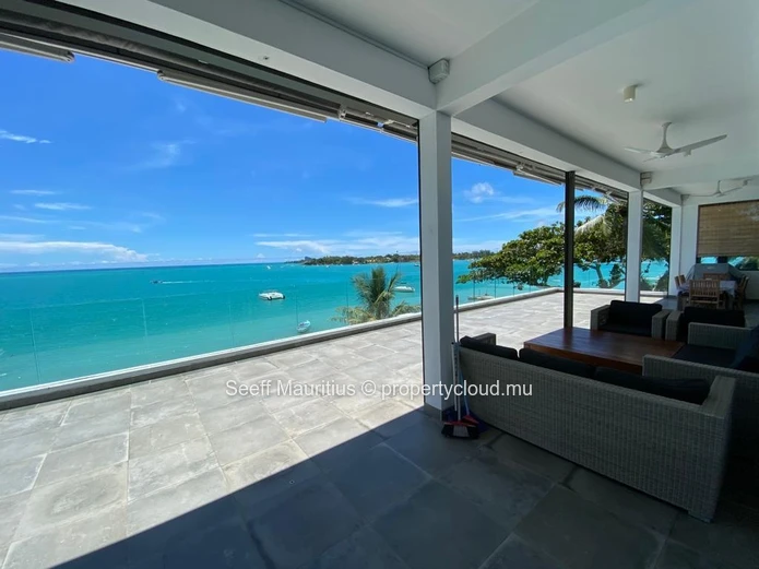 Oceanfront Oasis: Luxurious Beachfront Penthouse with Breathtaking Views