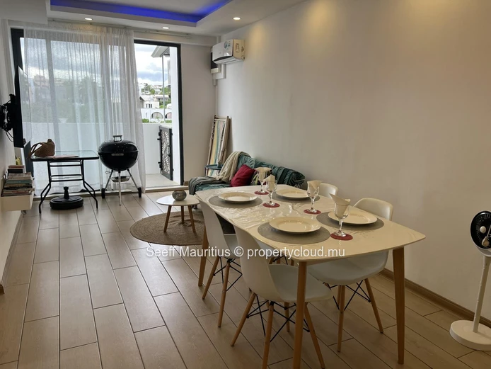 Modern 2-Bedroom Coastal Retreat with Panoramic Rooftop Pool