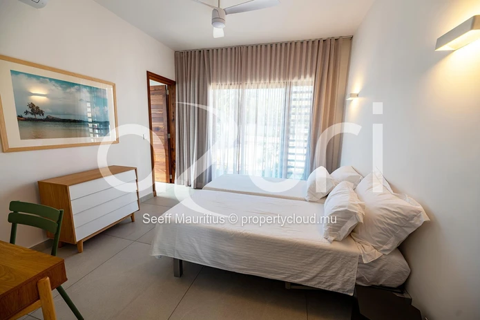Elegant Villa with Golf Course Views and Ocean Breezes