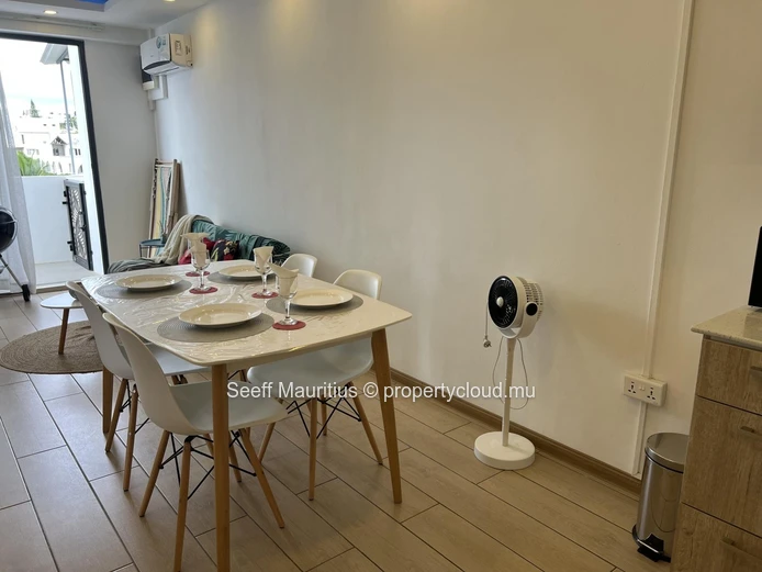 Modern 2-Bedroom Coastal Retreat with Panoramic Rooftop Pool